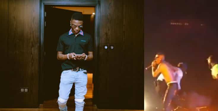 Wizkid falls on stage after an excited fan held on to his legs (Video)