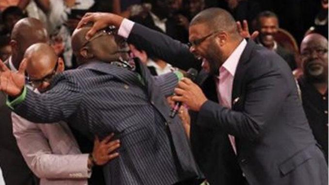 pastor performing miracle with speaking in tongues