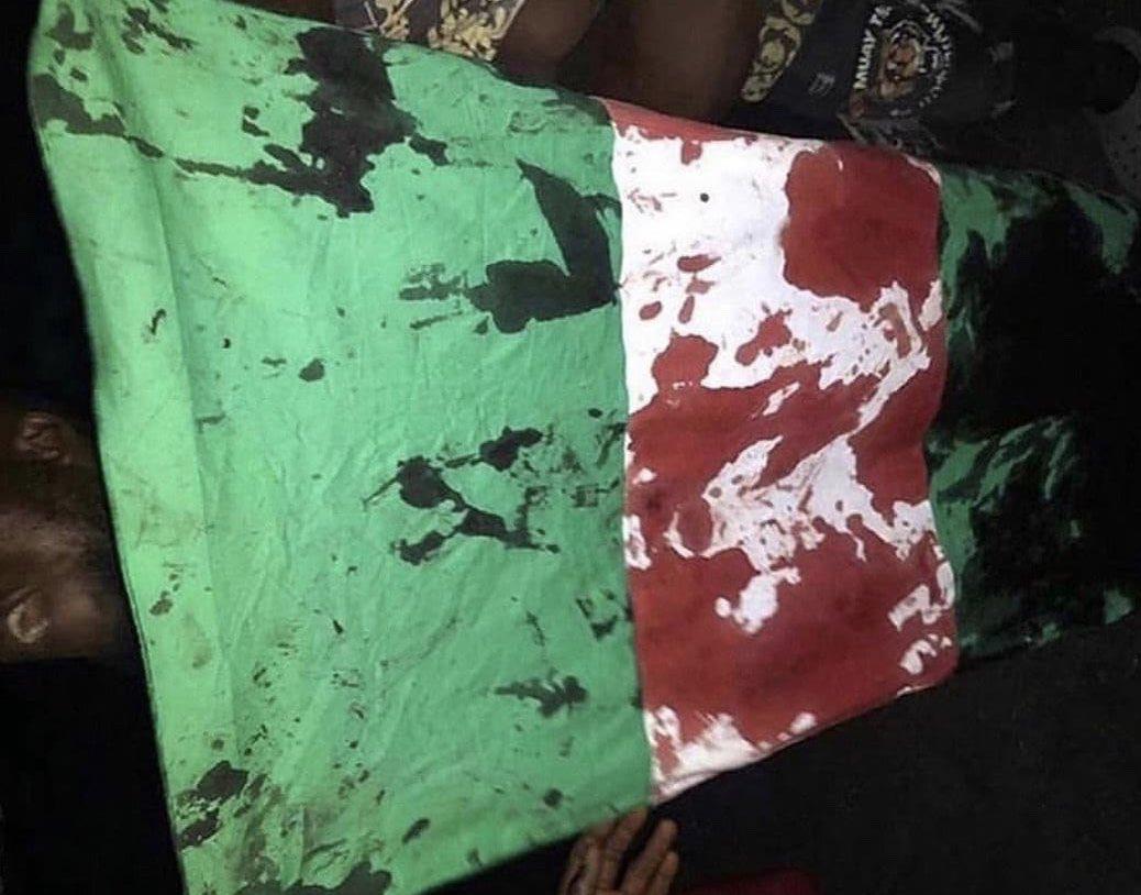 flag-stained-in-blood-lekki shooting