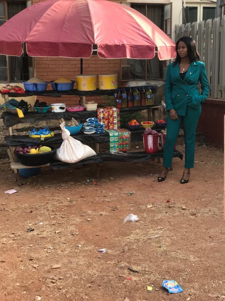 Lady leaves Nigerians in awe as she rocks corporate outfit to sell foodstuffs