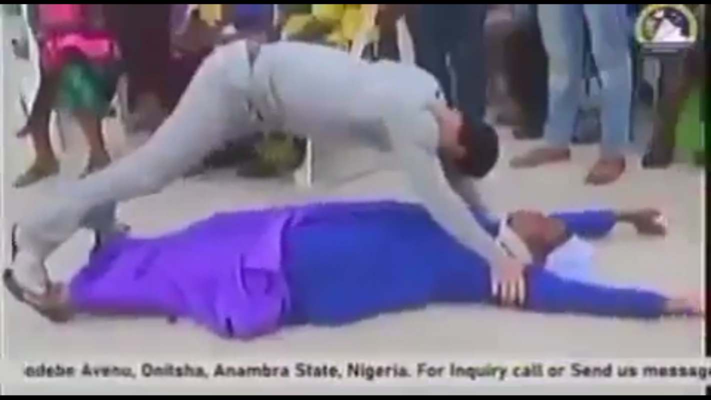 Pastor Odumeje performs deliverance in 'questionable position' on a woman, Nigerians react (Video)