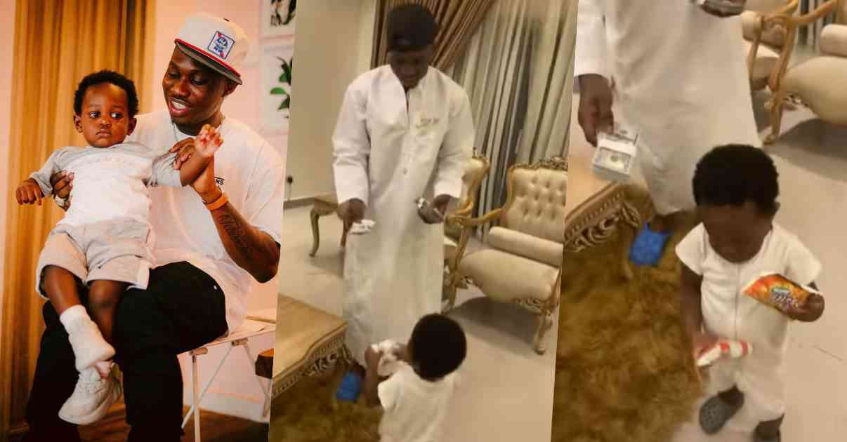 "If na girl na otherwise" - Zlatan Ibile expresses shock as son picks snacks over dollar bills (Video)