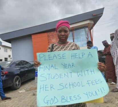 UNILAG final year student carries placard to beg for N225,000 school fees