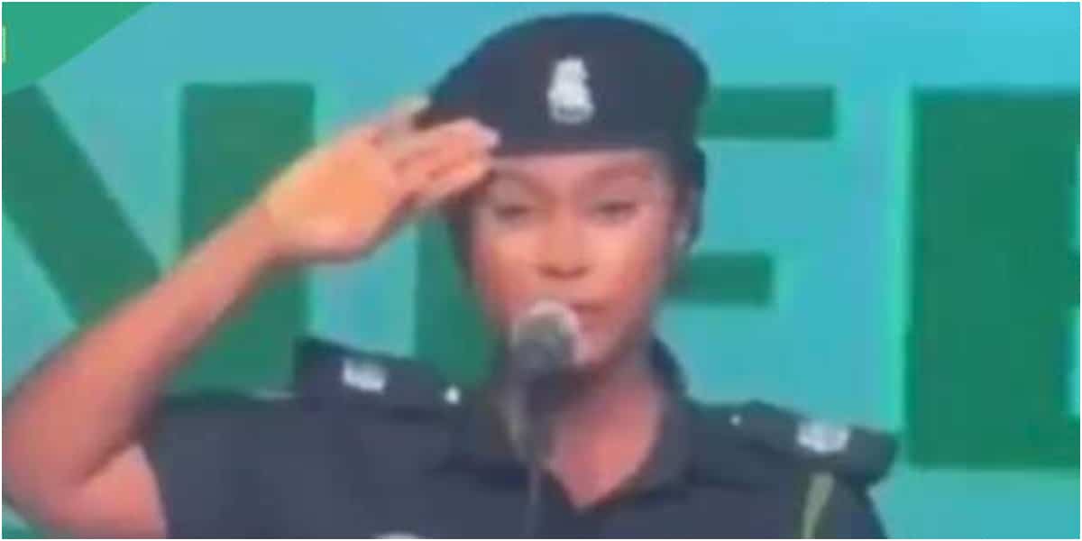 "How she take pass academy" - Mixed reactions as policewoman sings national anthem wrongly in confidence