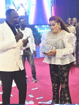 pastor's wife money spray church members