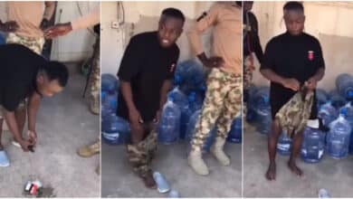Video shows Nigerian soldiers dealing with a man caught wearing military camouflage