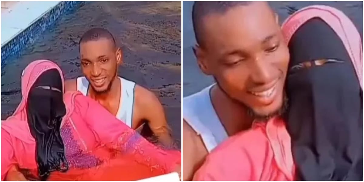 "Eti ya Werey" - Reactions as man goes swimming with his Niqobite Muslim wife