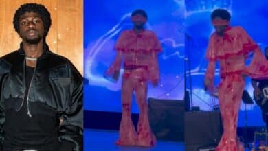 "This guy depression don reach dressing" – Reactions as Omah Lay performs on stage wearing a pink outfit