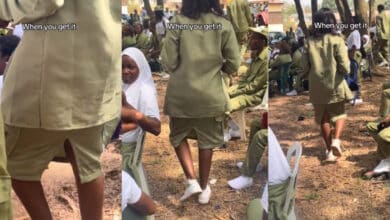 "She still wear hair wey no be her own" - Backlash as corper is seen putting on skirt at NYSC function