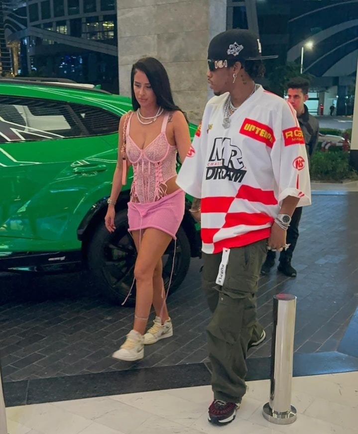 Tekno holds hands with mystery woman