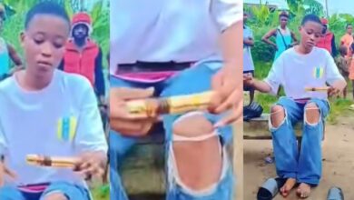 Nigerian lady caught on video using native charms to tie down her boyfriend, Wisdom, then forced to untie him