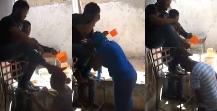 Video shows a pastor washing his legs on the head of his members