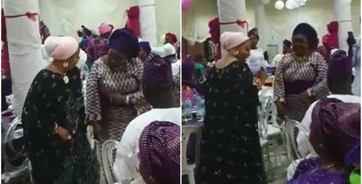 Lizzy Anjorin and Tobi Bakre’s mother giving them Zanku at Femi’s wedding 