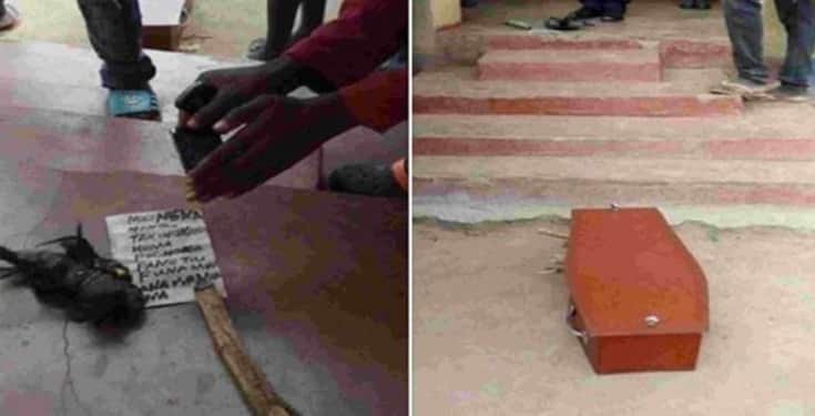 Man wakes up to find coffin and charm in front of his house