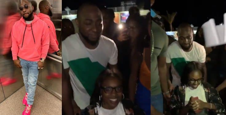 Davido helps a physically challenged lady in a wheelchair (video)
