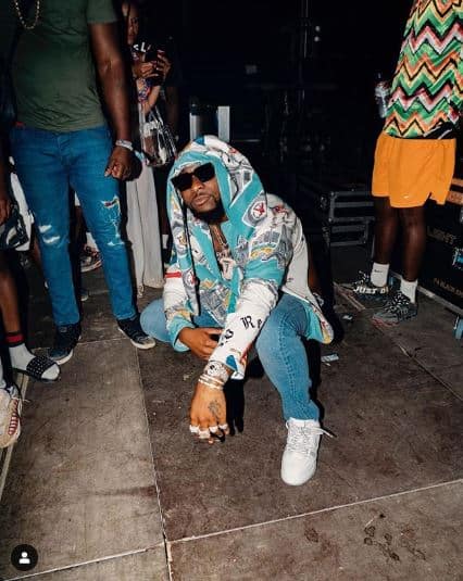 Davido helps a physically challenged lady in a wheelchair (video)