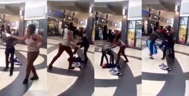 Lady drops her baby to assault her partner in a mall (video)