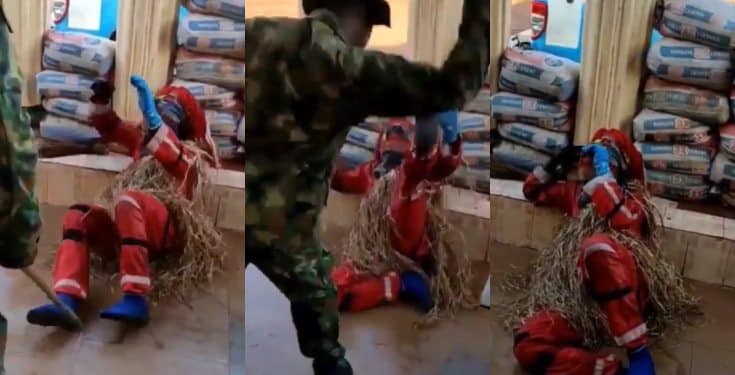 Masquerade begs for mercy while being flogged by a soldier (video)