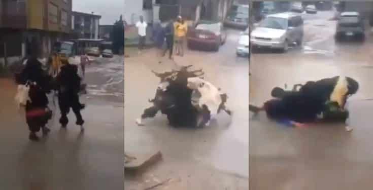 Masquerades spotted fighting on a busy road (video)