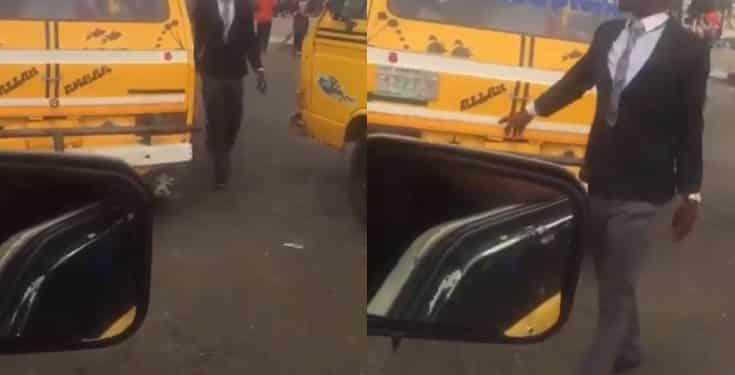 Bus conductor spotted in suit and tie in Lagos (video)