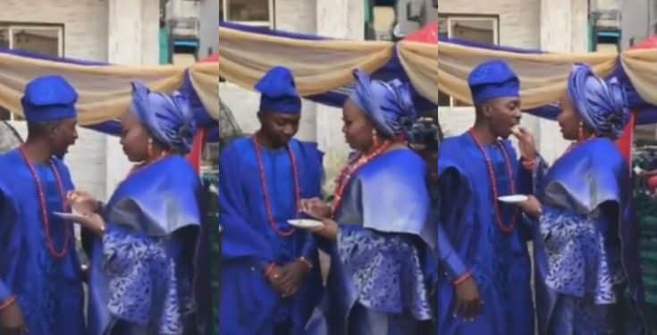 Lady praises her husband for stopping her from kneeling to feed him at their wedding (video)