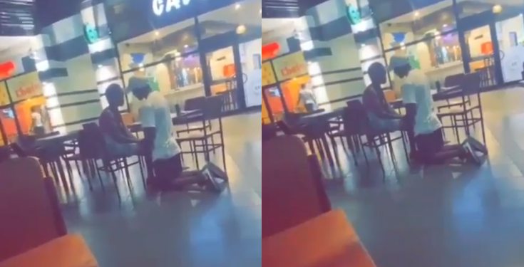 Man spotted kneeling down as he begs his girlfriend in public (video)