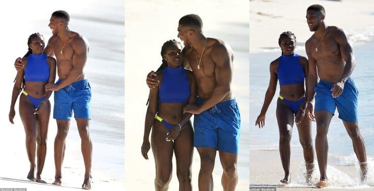 Anthony Joshua pictured with a female companion at the beach in Barbados (Photos)
