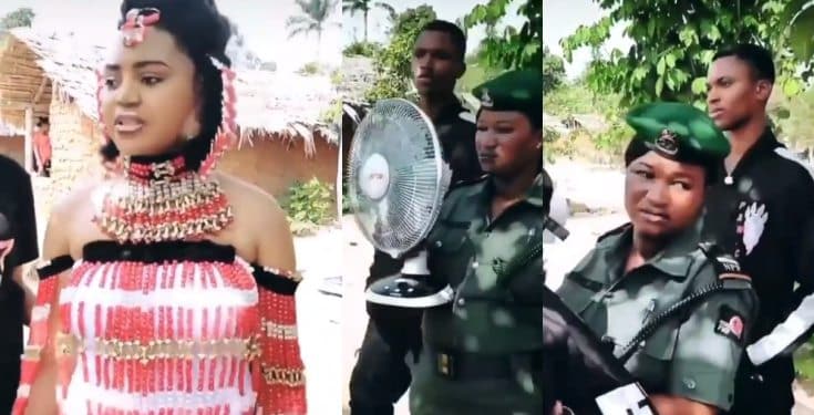 Nigerians react to video of police escort carrying fan for Regina Daniels 