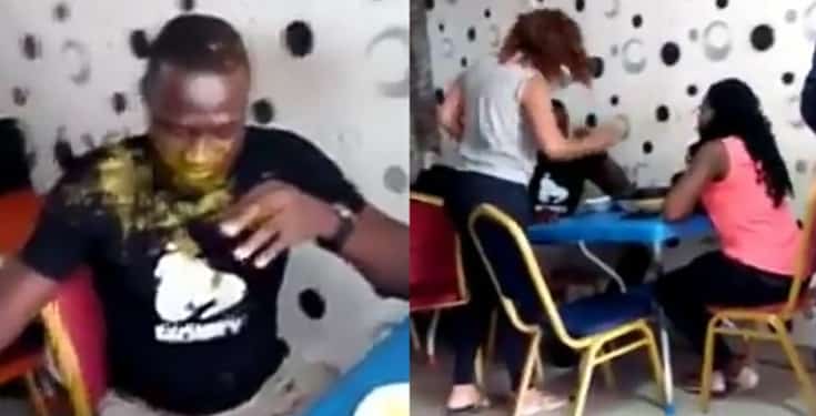 Shocking as lady slaps husband multiple times, pours soup on him before side chick