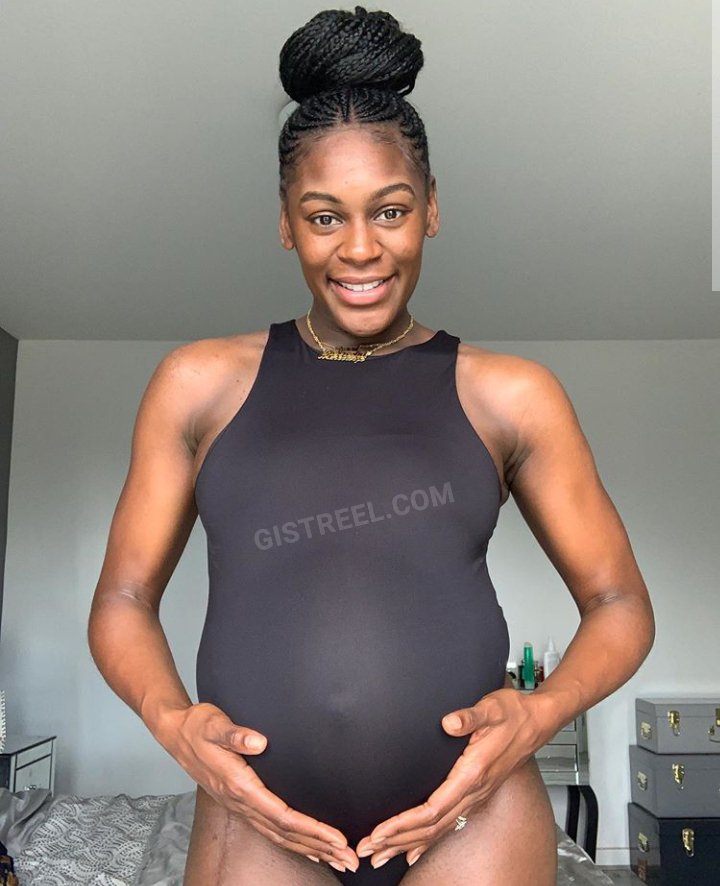 Perri Shakes cradles her baby