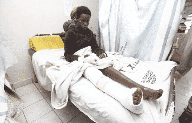 Policeman Drags Woman Along The Road