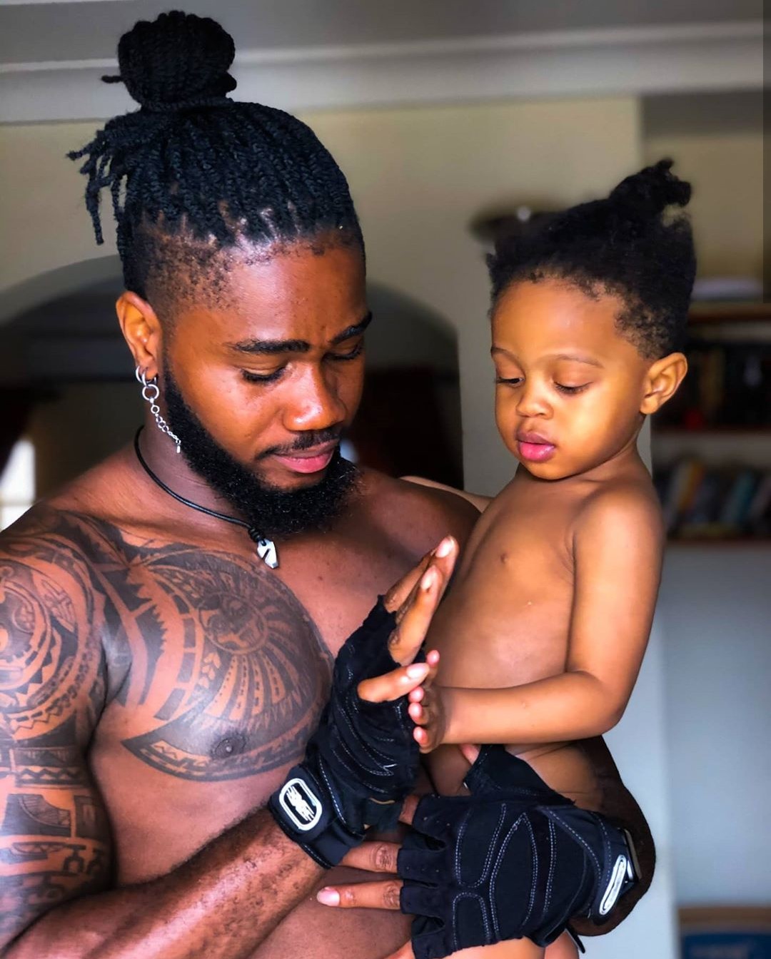 Nigerians dig up family photos of BBNaija's Praise after he said he is single