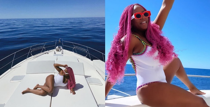 DJ Cuppy Dazzles In Swimsuit On A Boat Cruise In Monaco (Photos)