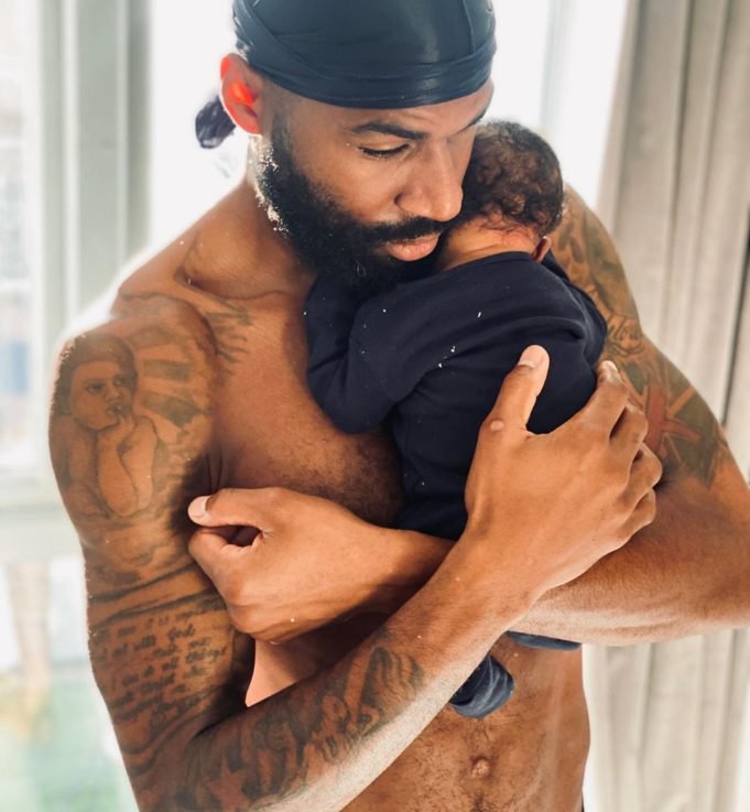 Mike Edwards Cradles Son