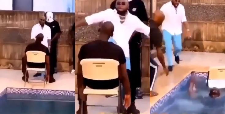 Davido pushes man into swimming pool