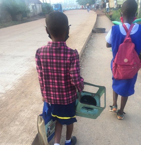 Student going to school with a stove