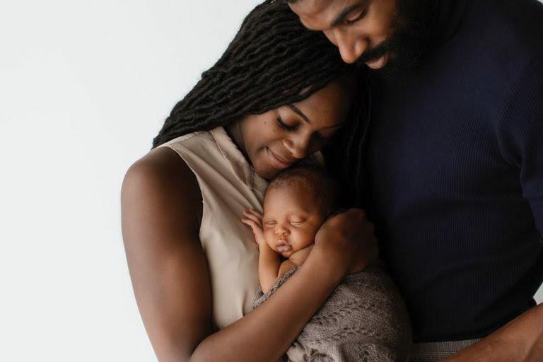 the edwards: Mike edwards, Perri Shakes-Drayton, and newborn baby, Mathew