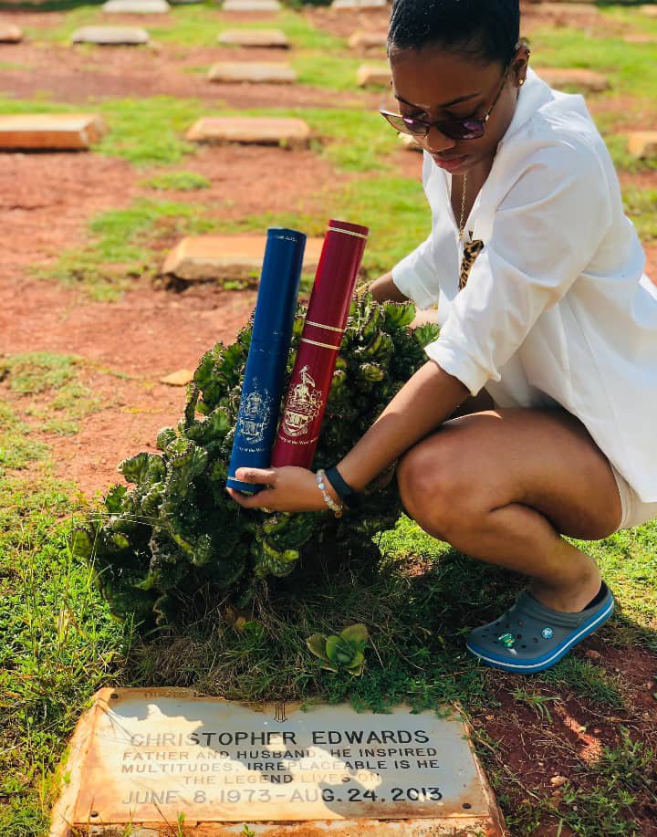 Presents Degrees to her late father