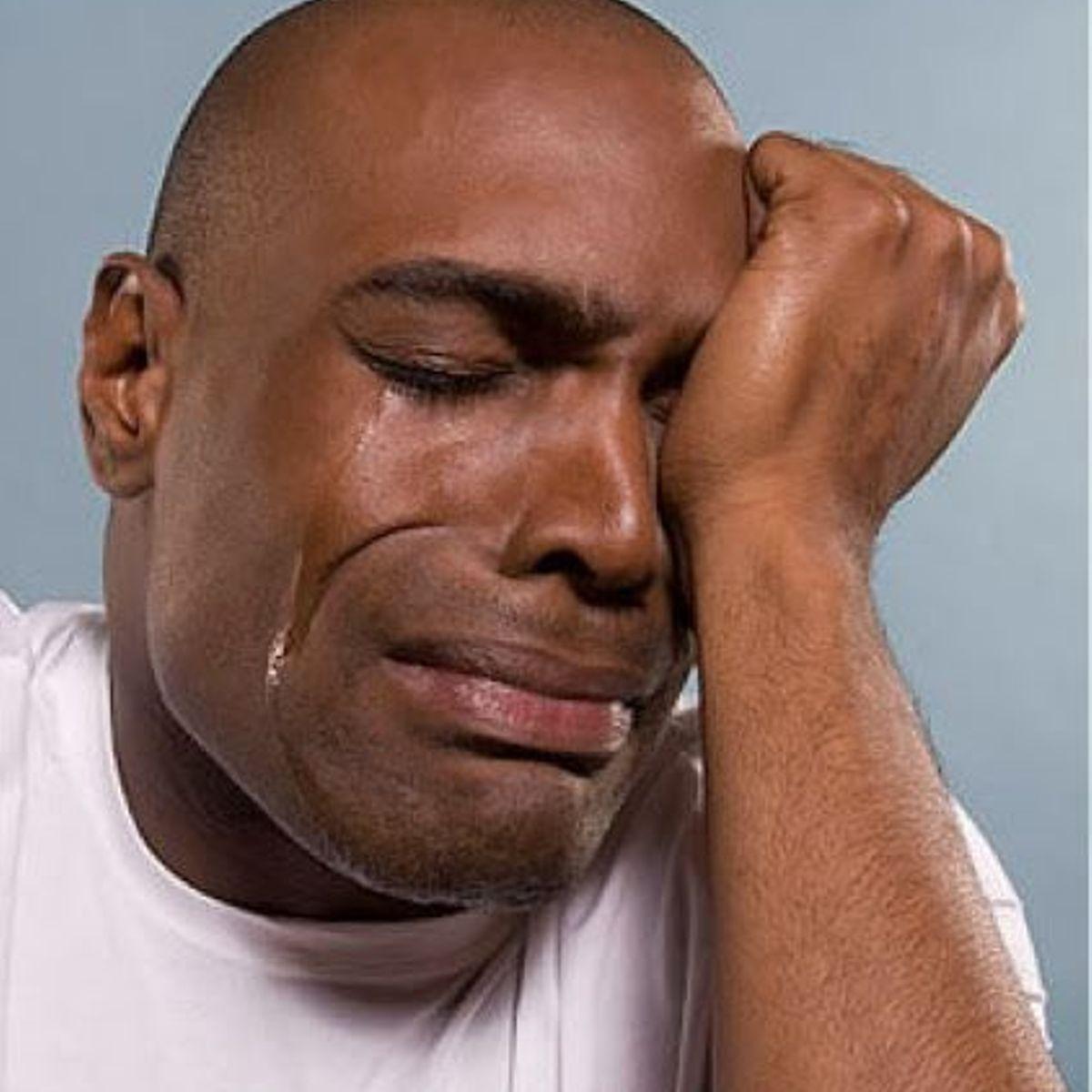 black man crying