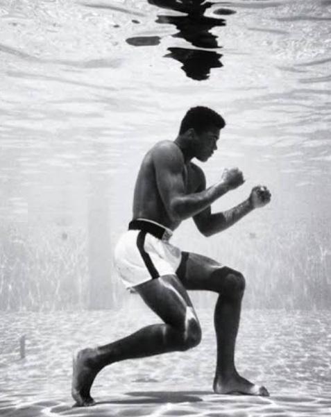 muhammad ali training in a pool