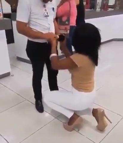 Moment lady proposes to man at his workplace (Video)