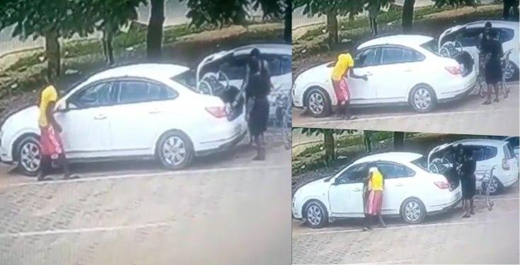 CCTV captures moment a young boy robbed a woman while offloading shopping bags in her trunk (Video)
