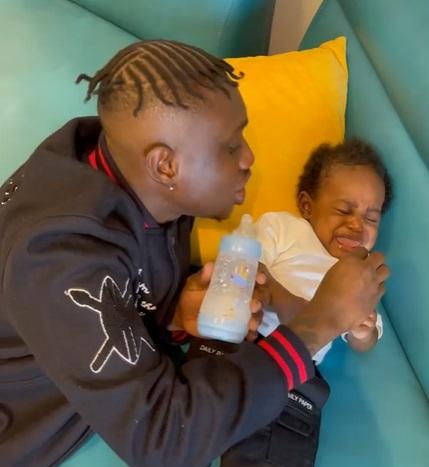 Nigerians drag Zlatan Ibile for snatching feeding bottle from his baby (Video)