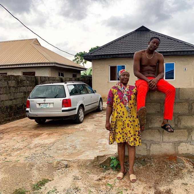 Young man celebrates after building a house for his mother