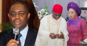 "Dem use woman do you" - Reactions as Femi Fani-Kayode shares photo exchanging number with woman