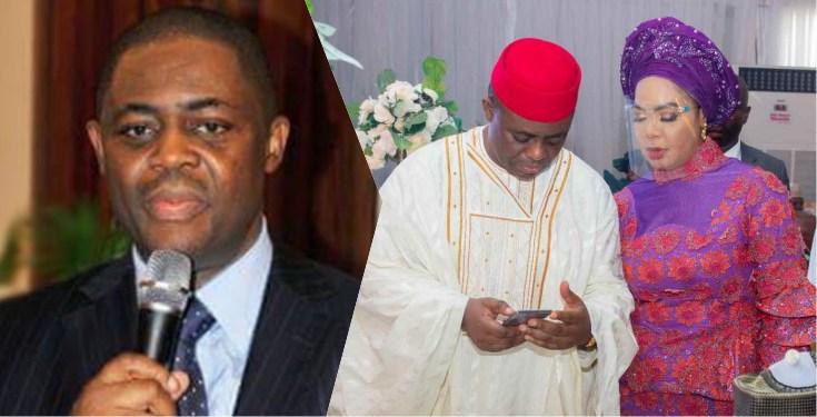 "Dem use woman do you" - Reactions as Femi Fani-Kayode shares photo exchanging number with woman