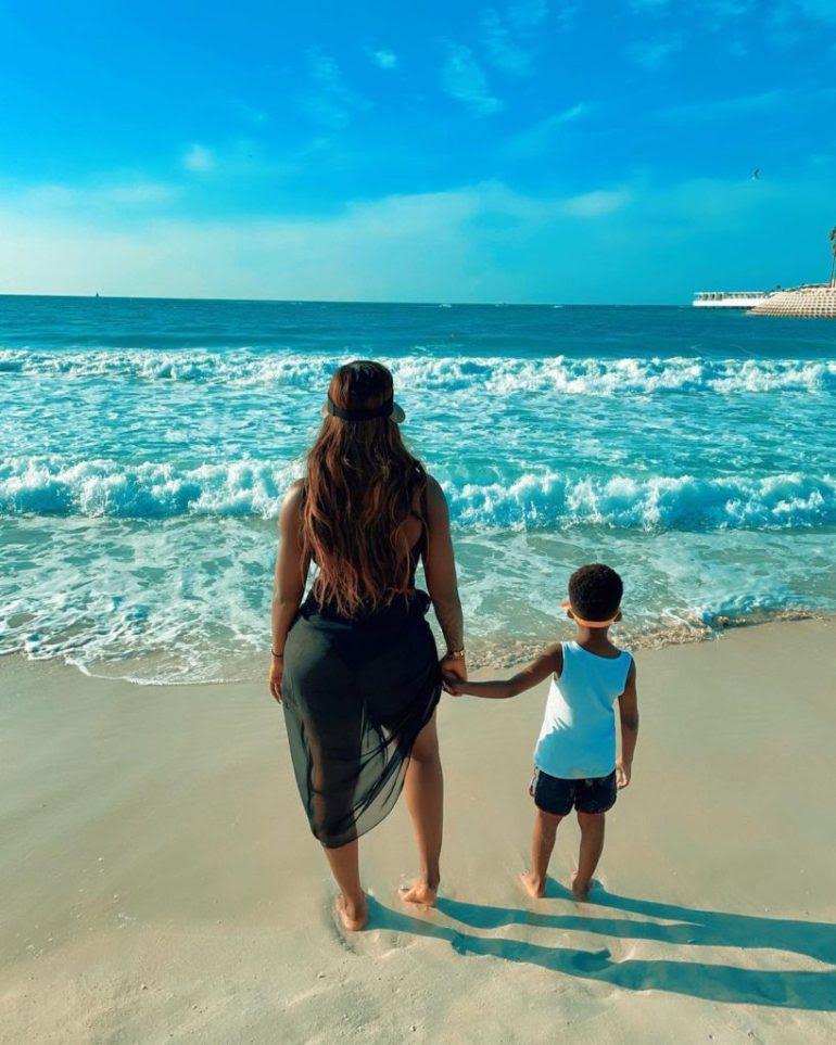 Davido reacts as Tiwa Savage shares beach photos with son on vacation