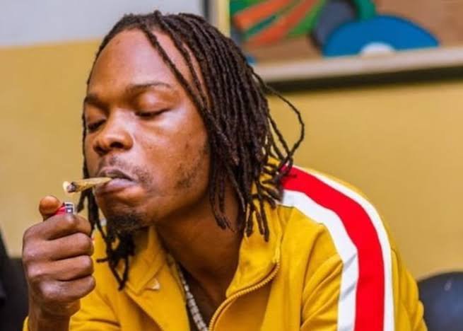 Naira Marley smokes weed