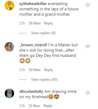 "Kobo you no go see" - Lady dragged for getting tattoo of Naira Marley on her lap