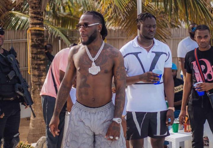 Burna Boy reacts after a mechanic called him out